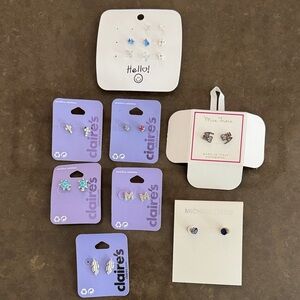 Lot of girls earrings. Claire’s, Michael Kors, and more. Never worn.